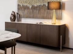 Clivia standing sideboard on high metal feet with Moka ash frame , Patagonia ceramic top and embossed Sand metal leg