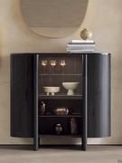 Dafne curved wood buffet cabinet with central glass door, structure in Absolute Black ash and top in Marquinia Black marble