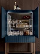 Interior view of the bar cabinet with smoked glass shelves, mirrored back and interior LED bars