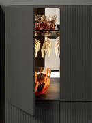 Interior view of the bar cabinet with smoked glass shelves, glass holder shelf, mirror on back and interior LED bars