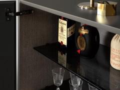 Interior view of the Oyster cabinet with one of the movable smoked glass shelves in the foreground