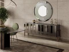 Modern sideboard with metal base Moma in the variant with smoked glass inserts, matching the Rising mirror and glass table top