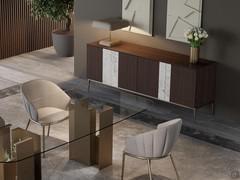 Four-door sideboard Quartetto with an elegant contrasting combination of doors and frame in dark oak essence wood and blanc de blanc matte ceramic inserts. Champagne base matching the structure of the Zentrum table