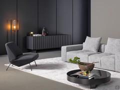 Bonaldo's Dorian 3-door sideboard in lead colour, perfectly placed against a dark-coloured wall