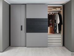 Sliding module with a set of drawers, shelf and clothes rail 