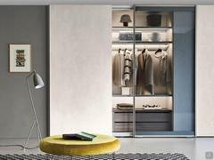 Alabama glass doors sliding wardrobe characterised by a frame with built-in metal handle in matt lacquer