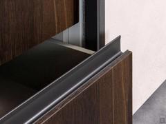 Close-up of the drawer with matt lacquered-metal recess grip