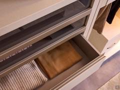 Detail of the Pacific wardrobe's internal drawer units, available both with smoked glass fronts and with drawers to match the other equipment