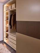 Another view of the interior of the Pacific flush wardrobe, again equipped with a variety of shelves, drawers and hangers that can be configured from the internal fittings