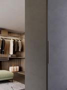 Rover Lounge sliding closet with leatherette-covered doors and lacquered metal handle integrated into the door frame