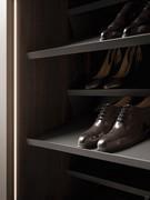 Detail of sloped shelves for shoe rack use in umber shine finish