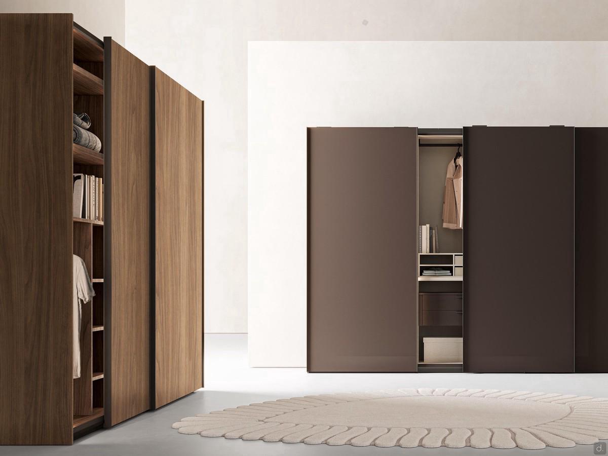 Midley Wide 3-door sliding wardrobes in the version with full-height profile handle painted mocha shine: bottom composition with matt lacquered doors mud, side composition with doors and interior in natural walnut veneer