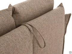 Detail of the fabric handle that facilitates the opening of the sofa bed