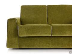 Frontal view of Myron sofa bed, covered in Vegas velvet colour 67 with piping in Vegas colour 45. 