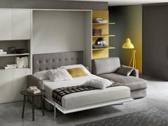 The open sofa bed Holdem with a quilted headboard: model with peninsula