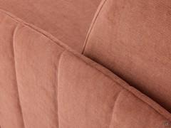 Detail of the armrest with vertical stitching covered in Floriante fabric with a distinctive chenille effect