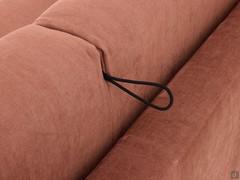 Detail of the cord for rotating the backrest: with the sofa bed closed, the cord is concealed in the gap between the two cushions