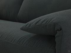 Details of the 8 cm wide armrest, which serves as a cushion and folds onto the seat