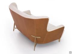 Rear view of the Doyle 2-seater sofa, highlighting the 1950s-style high back and metal feet that engage directly with it