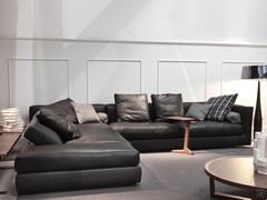 Omega black leather sofa with fold-down backrests and armrests that create a pleasant relaxation peninsula