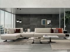 Antibes modern sectional sofa composed of a corner element with an ottoman, a central ottoman and an end element with a wooden storage table (high version no longer available)