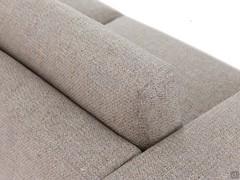 Detail of the sofa cover Richmond in Samba mat fabric