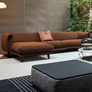 Bonaldo's Saddle sofa and chaise longue with cone-shaped metal feet