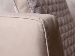 Detail of the stitching on the leather upholstery of the Roger sofa