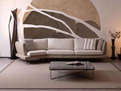 Roger sofa in Seta leather and Loto fabric in sand tones