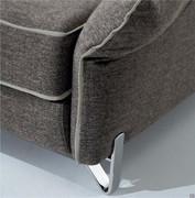 Detail of the chromed feet of Icaro sofa