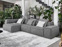 Designer sectional sofa Peanut B by Bonaldo in a classic linear configuration with chaise longue and wide armrests