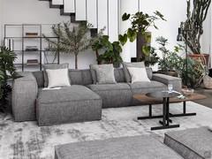 Design modular sofa Peanut B by Bonaldo in a linear version. The wide variety of available elements allows the creation of simpler compositions such as the one shown here