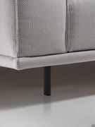 Foot in embossed black metal, one of the two versions available on the Aliseo sofa