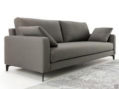 Detail of linear sofa Harold with high feet and minimal design