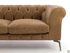 Curvy armrests are a charming detal of the sofa Bellagio