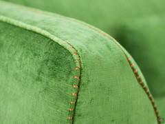 Detail of the curved stitching on the sofa armrest, embellished with Step embroidery