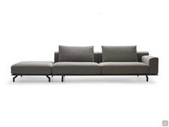 Cassis In the sectional linear sofa version with armrest on one side and side pouf on the other