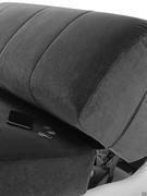 Detail of the connecting fabric between the seat and backrest that prevents objects from falling into the structure