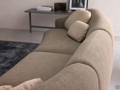 Detail of the curved and padded Laurent sofa backrest