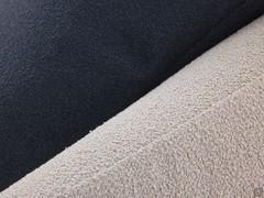 Detail of the armrests of the Laurent sofa, here upholstered in Venice col.156 fabric