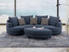 Messico curved sofa with a one-tone cover in Serra fabric