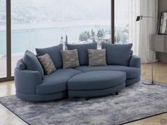 Messico sofa with its oval ottoman to form a pleasant relaxing "isle"