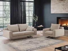 Living room with 2-seater sofa and Arren armchair, both covered in stain-resistant Smack fabric