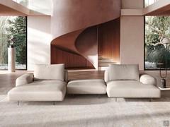 The peculiar floating effect of this solution that includes starting from the left: chaise longue, central pouf, side element 