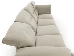 Side view of Carnaby sofa with folded down back cushions in different positions