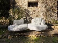 Modern sofa with mobile backrests Island in a composition of two terminal elements