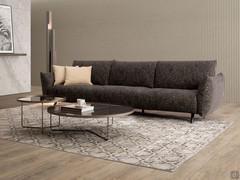 Malibù sofa with upholstered cushion-shaped armrests and backrests