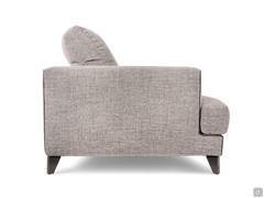 Side view of the Harvey sofa highlighting the backrest structure at the same level as the armrest that accommodates the soft, generous back cushions and hammerhead seats