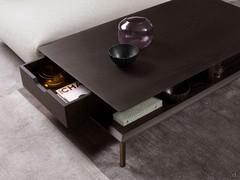 Detail of pouf with cabinet and open drawer