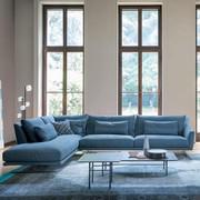 Skid is a sofa with tall metal sleigh legs by Bonaldo